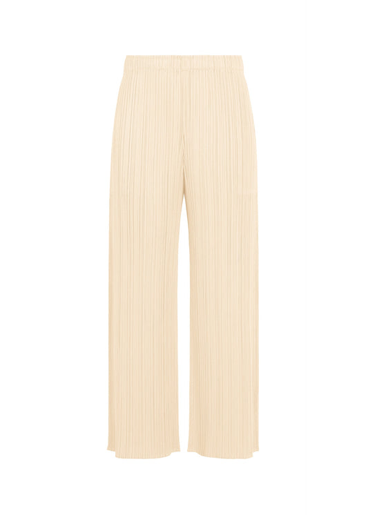 A product shot of the PLEATS PLEASE ISSEY MIYAKE MONTHLY COLORS : AUGUST trousers in off white.