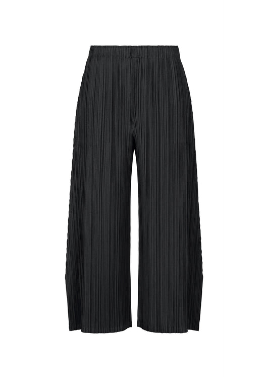 A product shot of the PLEATS PLEASE ISSEY MIYAKE MELLOW PLEATS trousers in black.