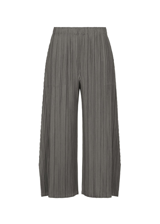 A product shot of the PLEATS PLEASE ISSEY MIYAKE MELLOW PLEATS trousers in charcoal.