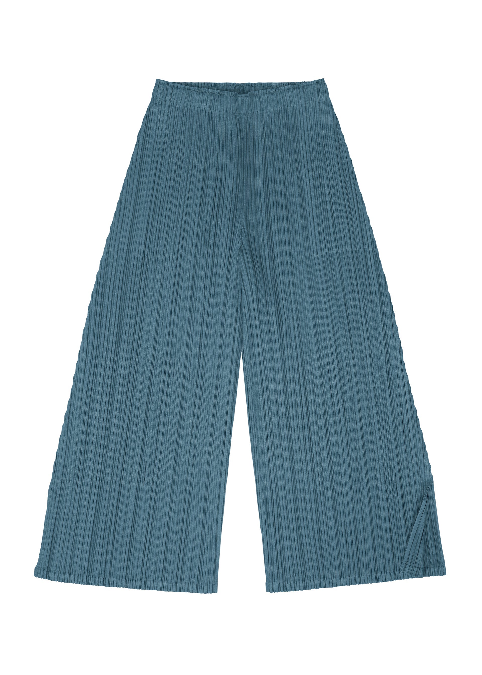 A detail shot of the PLEATS PLEASE ISSEY MIYAKE MELLOW PLEATS trousers.