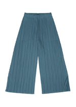 A detail shot of the PLEATS PLEASE ISSEY MIYAKE MELLOW PLEATS trousers.