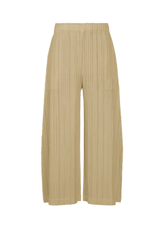 A product shot of the PLEATS PLEASE ISSEY MIYAKE THICKER BOTTOMS 1 trousers in sand beige.