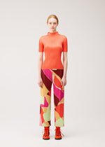 A model wears the PLEATS PLEASE ISSEY MIYAKE SURPRISE! surprise-trousers-purple.