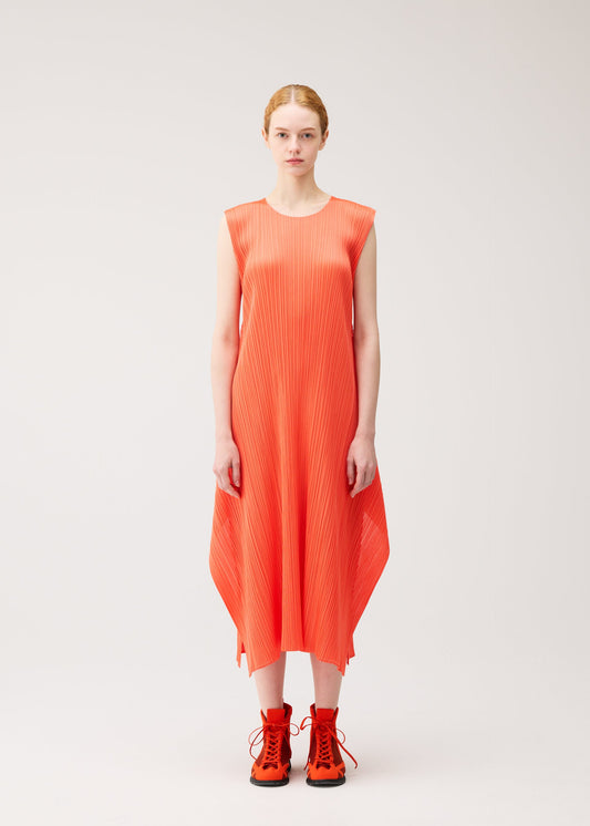 A model wears the PLEATS PLEASE ISSEY MIYAKE MONTHLY COLORS : SEPTEMBER monthly-colors-september-dress-red-brown-1.