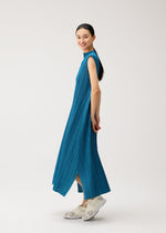A model wears the PLEATS PLEASE ISSEY MIYAKE MELLOW PLEATS mellow-pleats-sleeveless-dress-black.