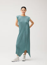 A model wears the PLEATS PLEASE ISSEY MIYAKE FOLD fold-dress-mint-green.