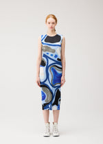 A model wears the PLEATS PLEASE ISSEY MIYAKE ROLL dress.