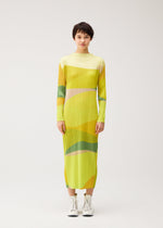 A model wears the PLEATS PLEASE ISSEY MIYAKE ORBIT orbit-dress-green.