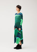 A model wears the PLEATS PLEASE ISSEY MIYAKE ORBIT orbit-a-line-dress-green.
