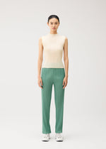 A model wears the PLEATS PLEASE ISSEY MIYAKE MONTHLY COLORS : AUGUST monthly-colors-august-top-greyish-purple.