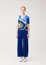 A model wears the PLEATS PLEASE ISSEY MIYAKE ROLL top.