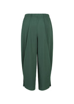 A detail shot of the PLEATS PLEASE ISSEY MIYAKE A-POC BOTTOMS trousers.