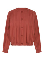 A product shot of the PLEATS PLEASE ISSEY MIYAKE SMOOTH COAT coat in terracotta.
