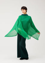 A model wears the PLEATS PLEASE ISSEY MIYAKE MADAME-T OCTOBER madame-t-october-stole-yellow-ochre.
