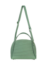 A detail shot of the PLEATS PLEASE ISSEY MIYAKE BIAS PLEATS BAG shoulder bag.
