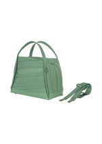 A detail shot of the PLEATS PLEASE ISSEY MIYAKE BIAS PLEATS BAG shoulder bag.