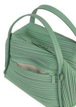 A detail shot of the PLEATS PLEASE ISSEY MIYAKE BIAS PLEATS BAG shoulder bag.